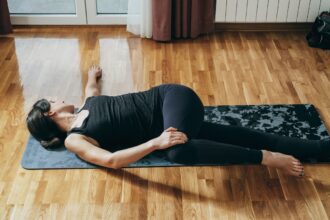 Sit All Day? The Open Book Stretch Can Give Your Stiff, Sore Back Much-Needed Relief