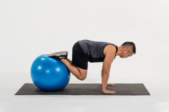 Stability Ball Knee Tucks: Instructions and Muscles Worked