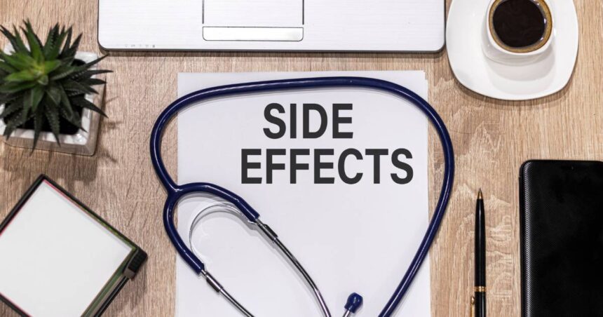 The words side effects on a piece of paper on a doctor