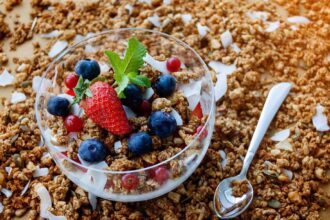 A bowl of muesli with fruits