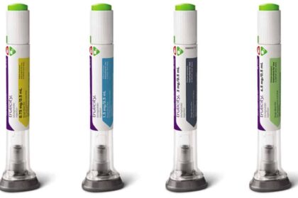 Four Trulicity pens on a white background