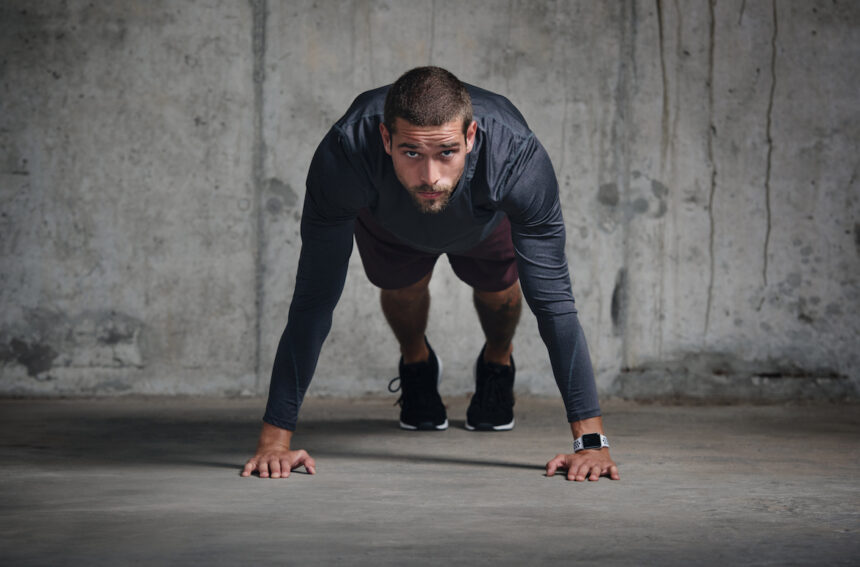 The Benefits of a CrossFit Wall Walk—And How To Perform It Properly