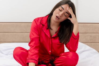 A tired woman on the bed