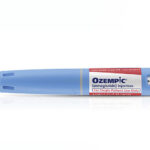 blue ozempic cartridge against a white background