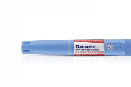 blue ozempic cartridge against a white background