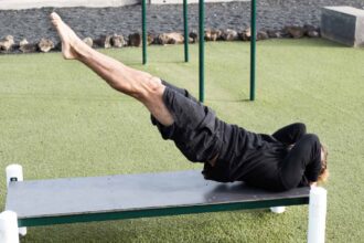 Strengthen your core with dragon flag exercise